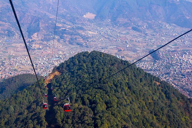 Chandragiri Hill Day Tour - The cable car ride over forest and homes