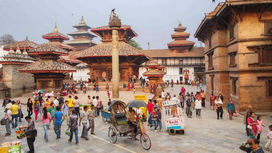 Kathmandu Sightseeing By Bus Day Trip - How the transport and group format affect the day