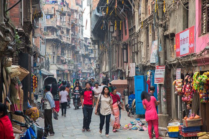 Local Bazaar Walking Tour in Kathmandu with Professional Guide - Timing, walking comfort, and pickup limits