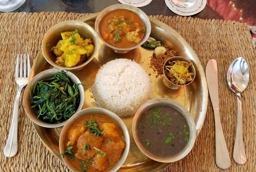 MoMo or Dal Bhat Cooking Class at Aama Kitchen in Pokhara - Cooking beside a Nepali mother