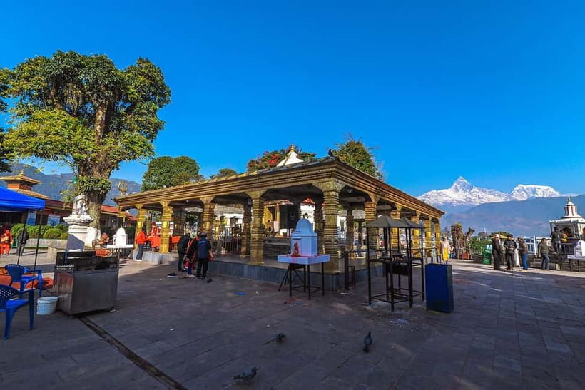 Pokhara: City Sightseeing Group Budget Bus Tour - Bindabasini Temple adds a living religious stop